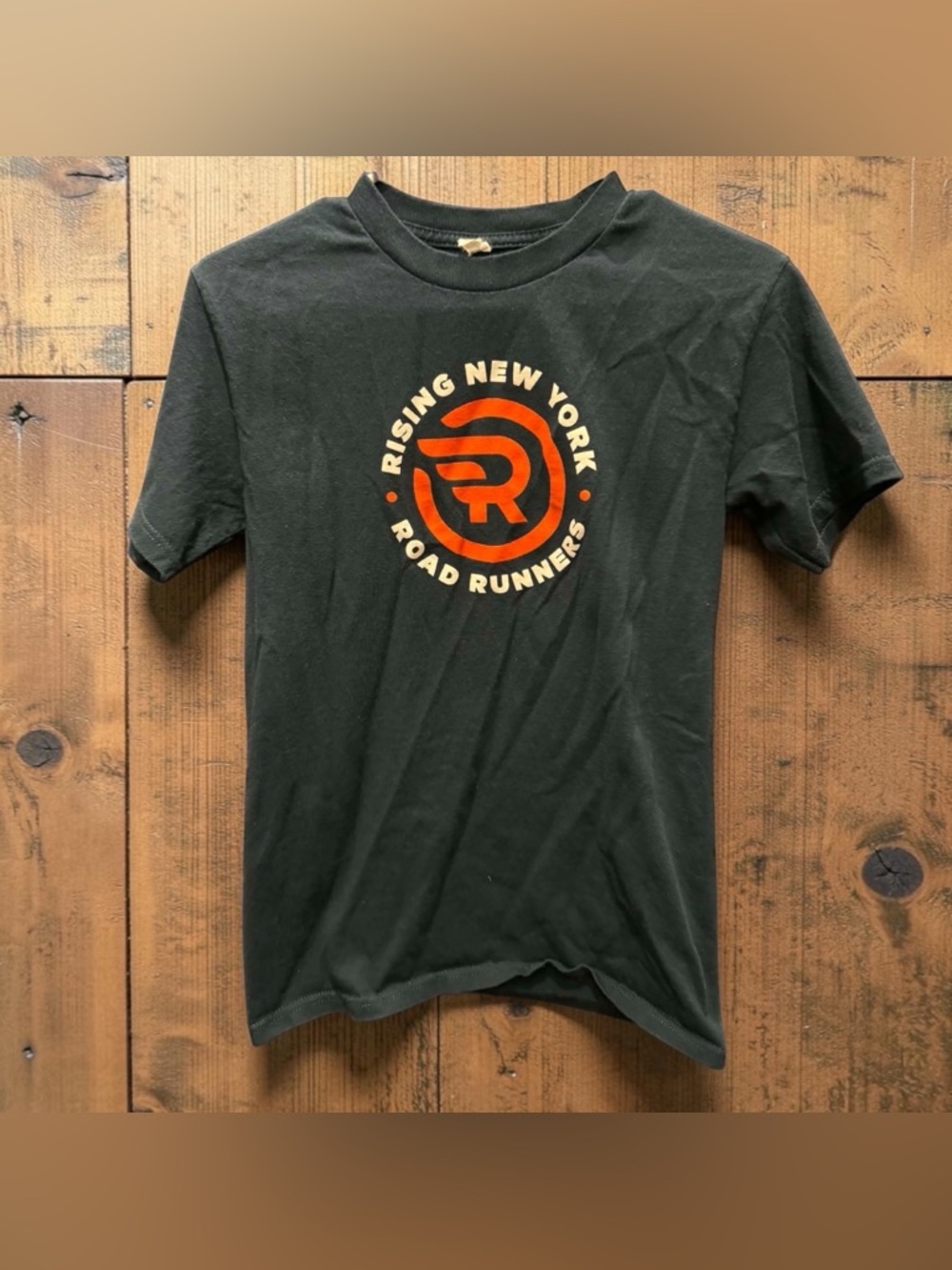 Alstyle Black Short Sleeve Tee with Orange & Cream Rising New York Graphic SMALL